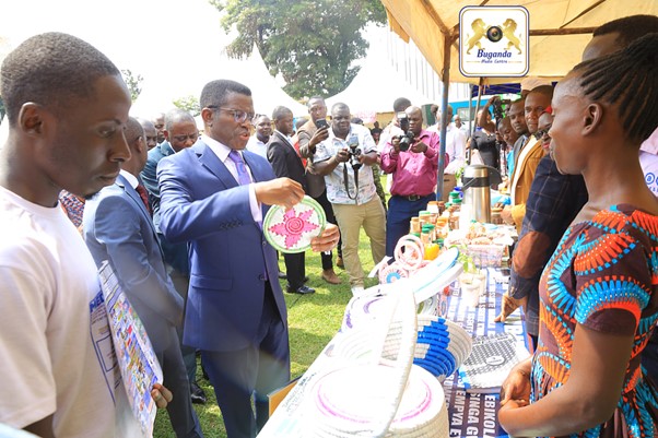 The youth exhibiting their products to the Prime Minister